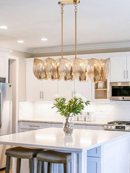 Amber Linea – 12-Light Linear Pendant in Brass with Artisan Glass