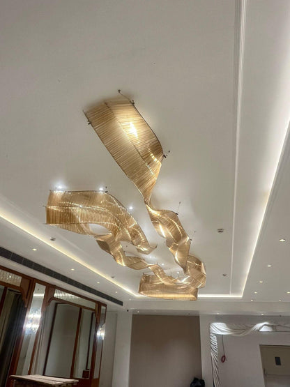 Aurora Drift – Sculptural Glass Chandelier in Amber & Metal