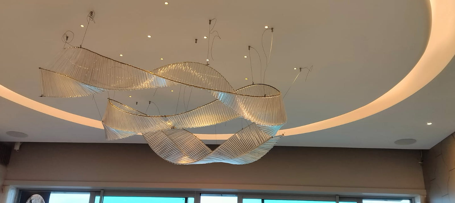 Crystal Veil – Ribbon-Inspired Sculptural Chandelier in Clear Glass
