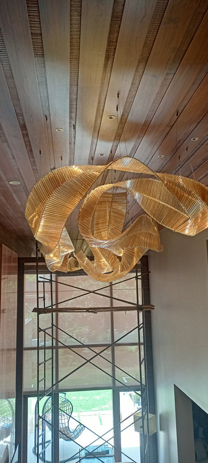 Aurora Drift – Sculptural Glass Chandelier in Amber & Metal