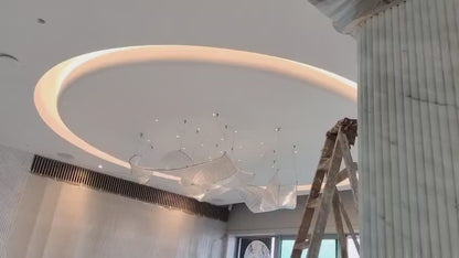 Crystal Veil – Ribbon-Inspired Sculptural Chandelier in Clear Glass