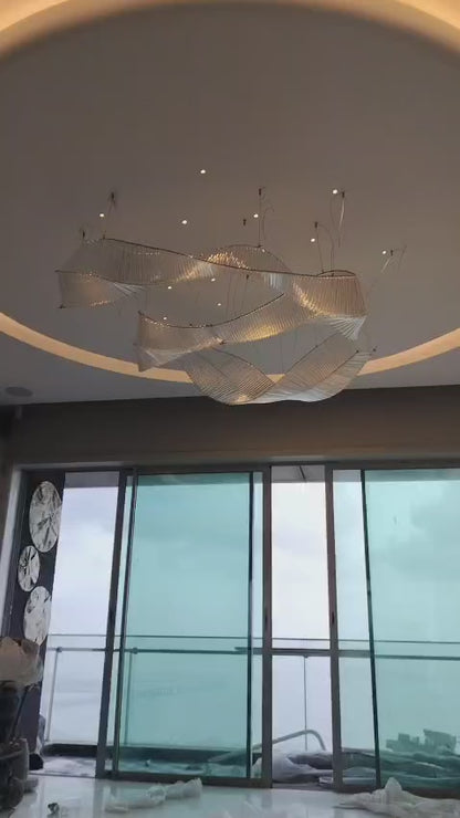 Crystal Veil – Ribbon-Inspired Sculptural Chandelier in Clear Glass