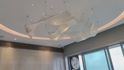 Crystal Veil – Ribbon-Inspired Sculptural Chandelier in Clear Glass