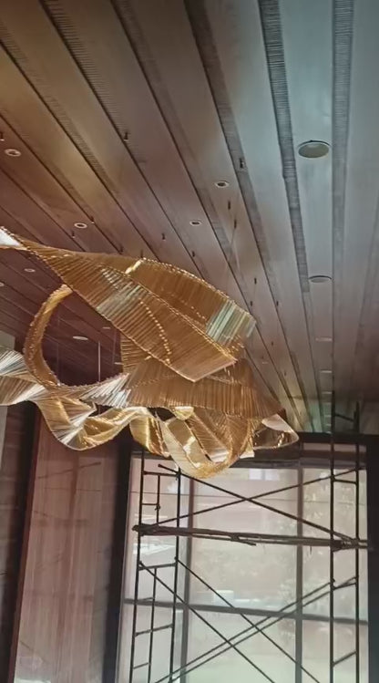 Aurora Drift – Sculptural Glass Chandelier in Amber & Metal